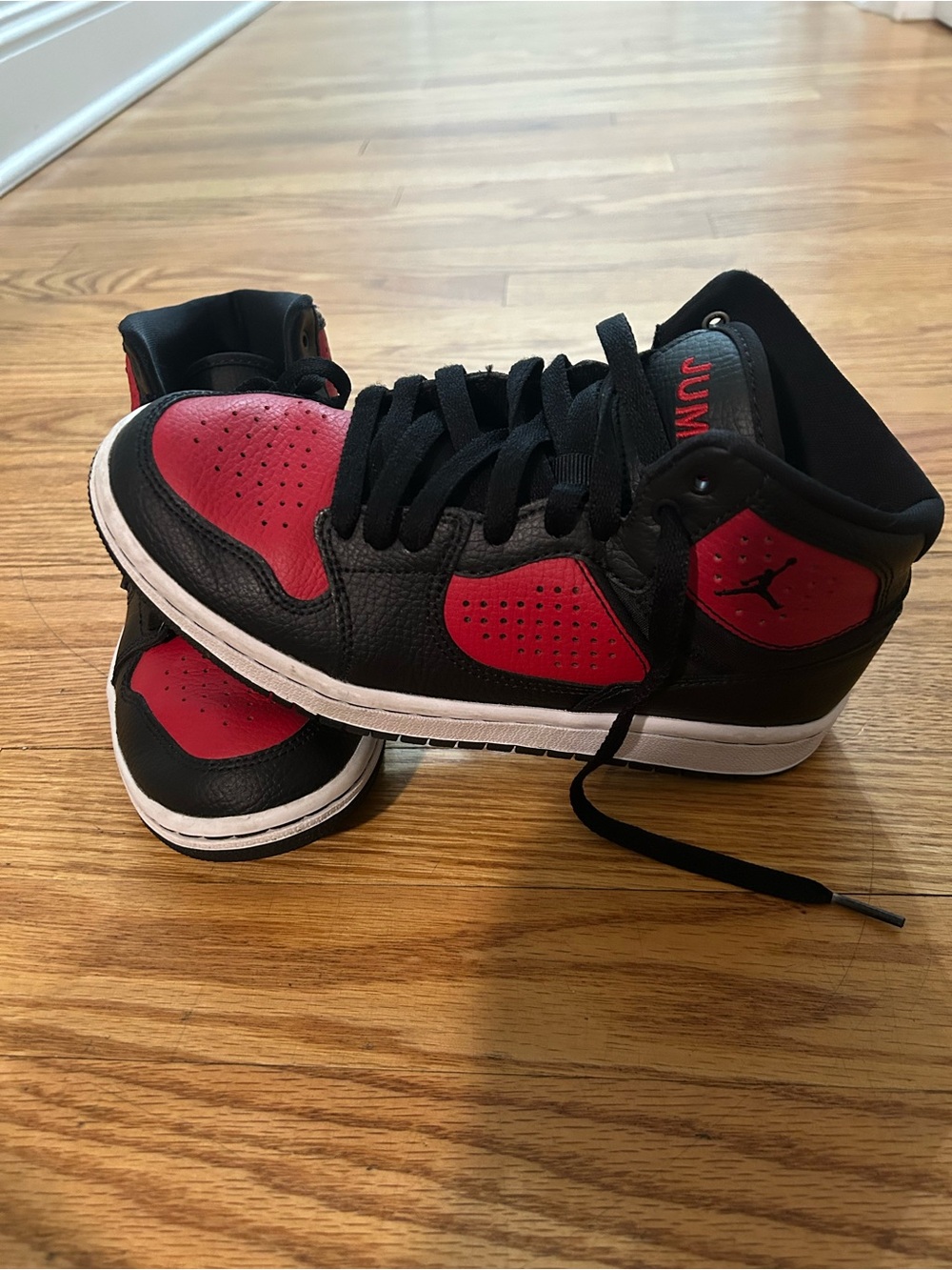 Jordan Black and Red Mid-Top Sneakers big kid